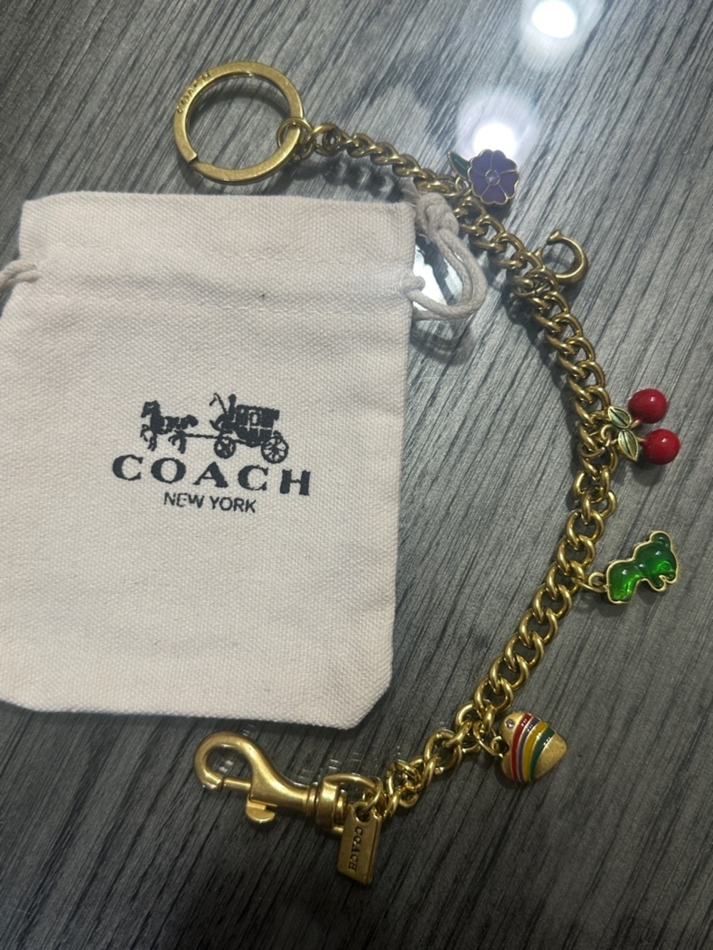 Coach Gold-Tone Charm Keychain with Red, Green, Purple, Yellow Accents